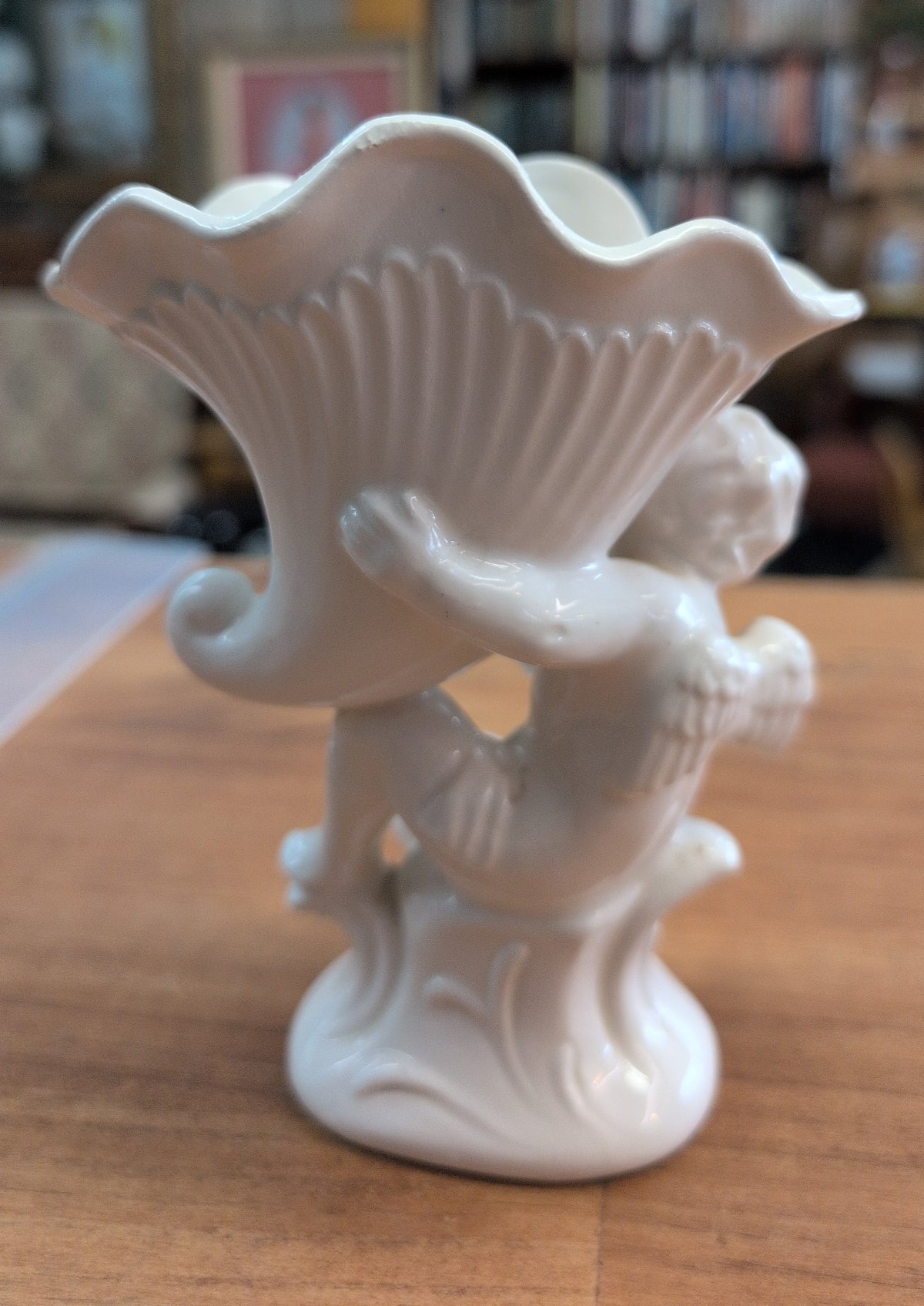 Ceramic Vase with Cherub and Floral embellishments. 3"x4"