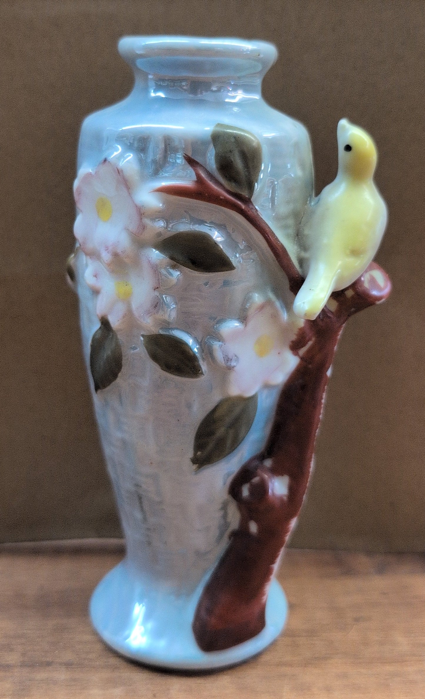 Japanese hand-painted porcelain bud vase with bird and blossoms.