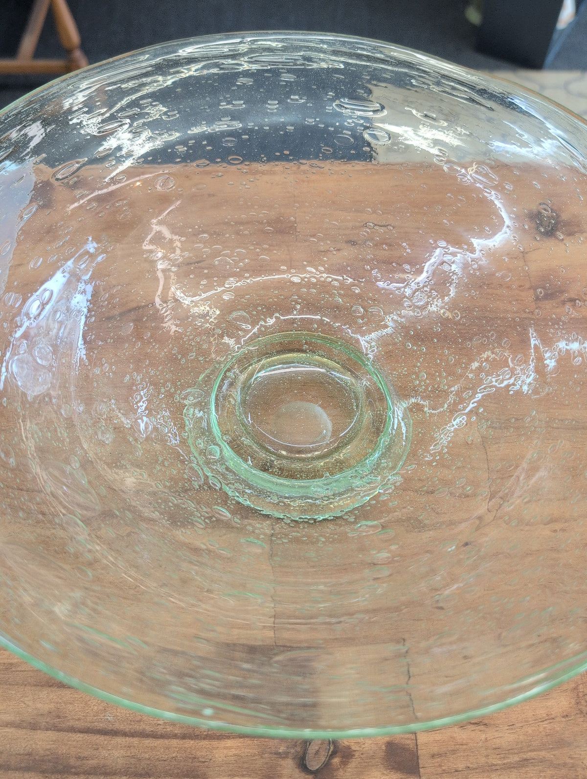 Hand-blown green Blenko glass bowl with trapped air bubbles
