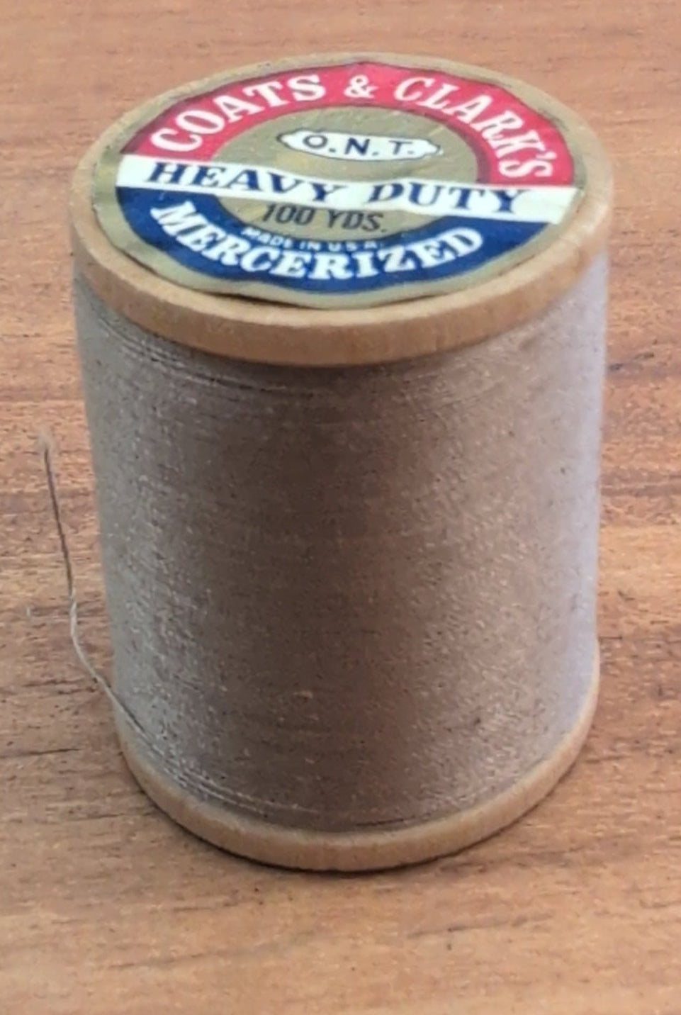 Coats and Clarks Tan Sewing Thread.
