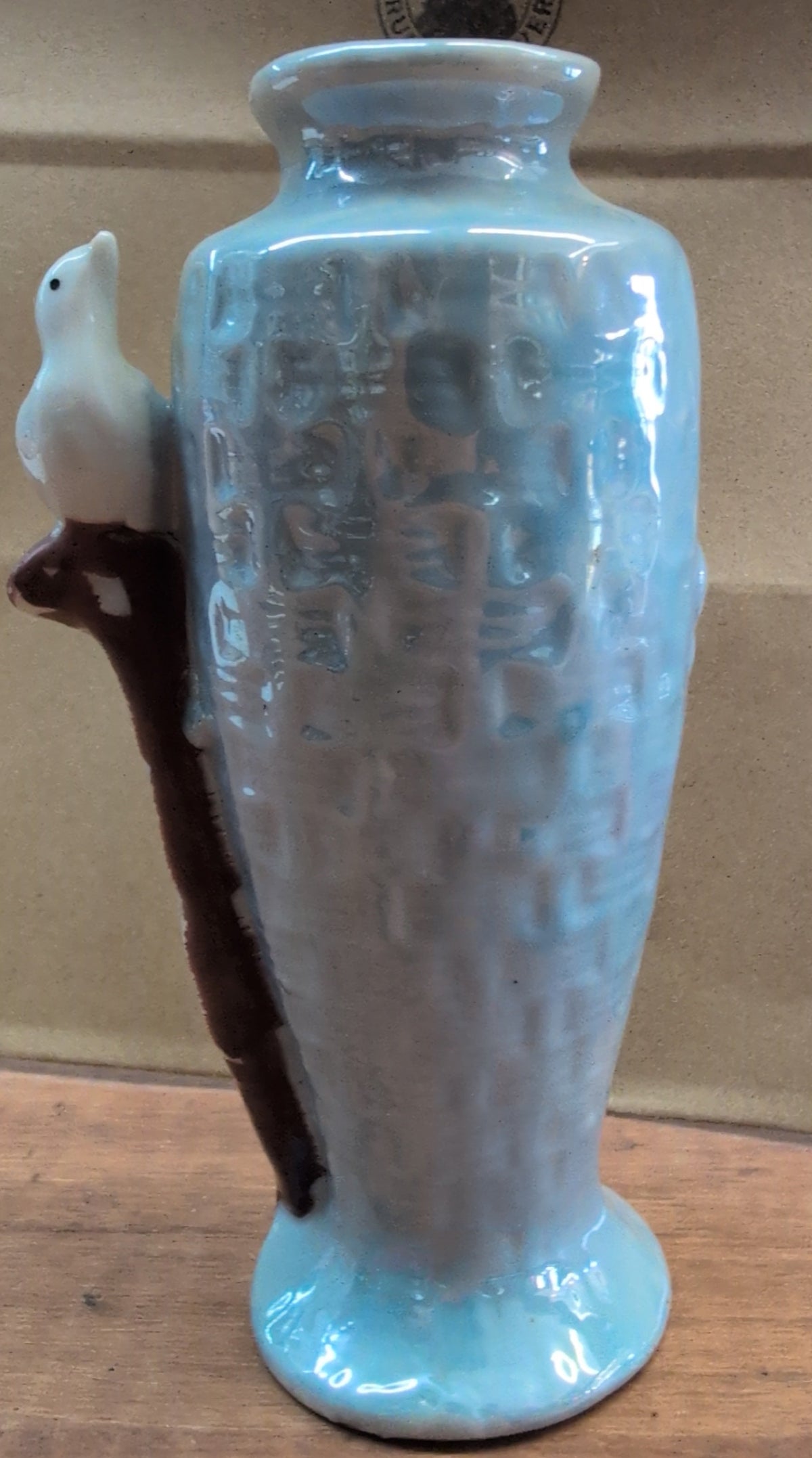 Japanese hand-painted porcelain bud vase with bird and blossoms.