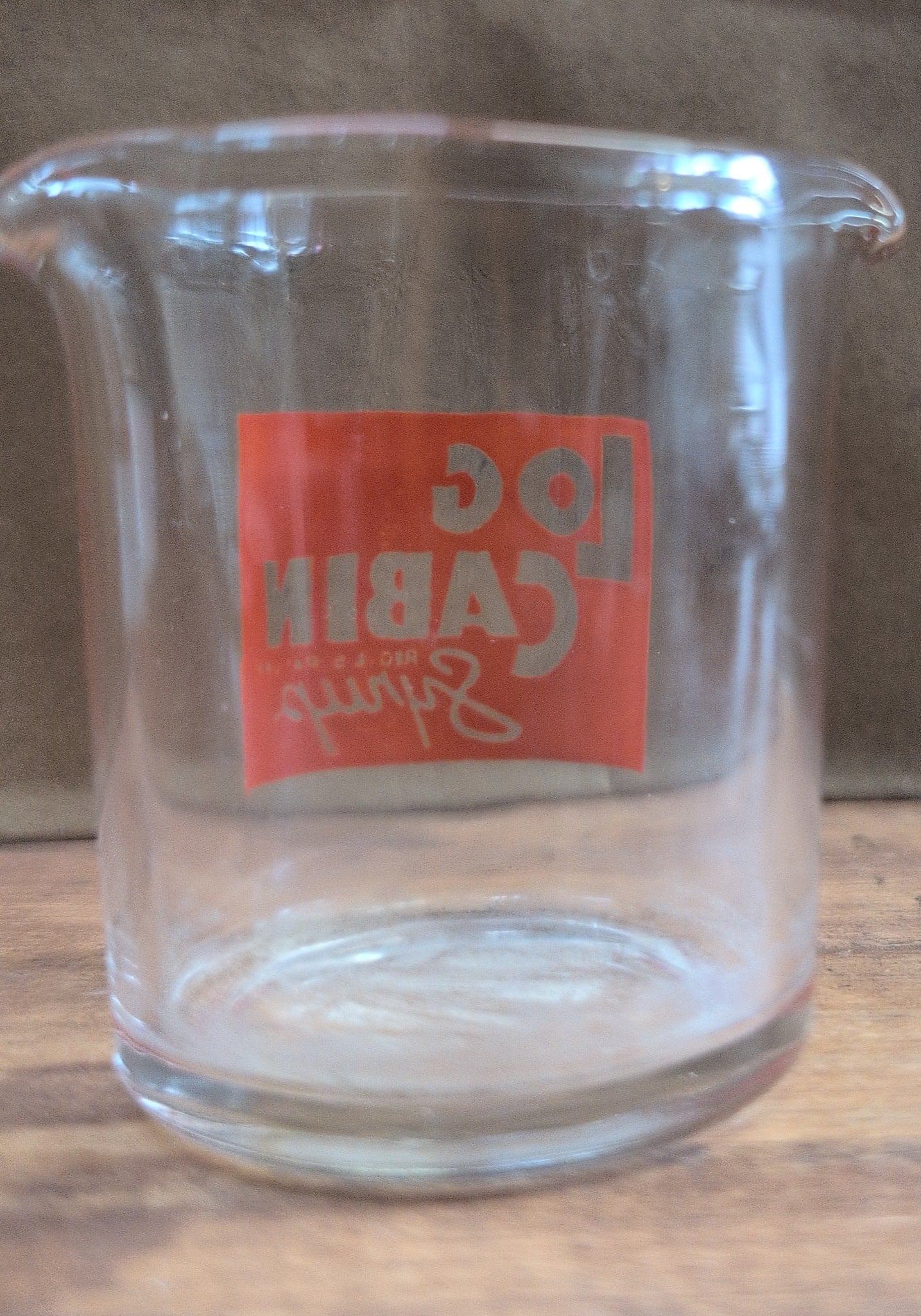 Vintage log cabin Syrup Mini measuring cup.