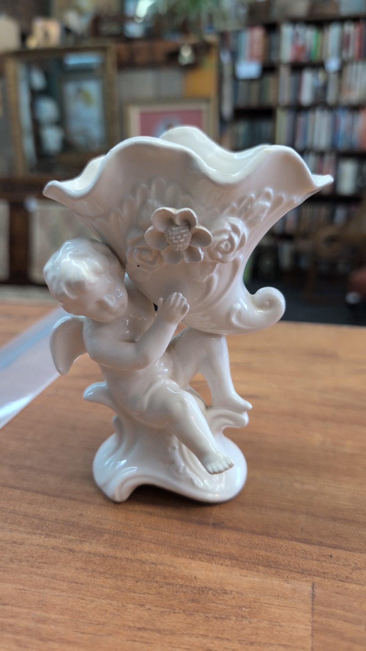 Ceramic Vase with Cherub and Floral embellishments. 3"x4"